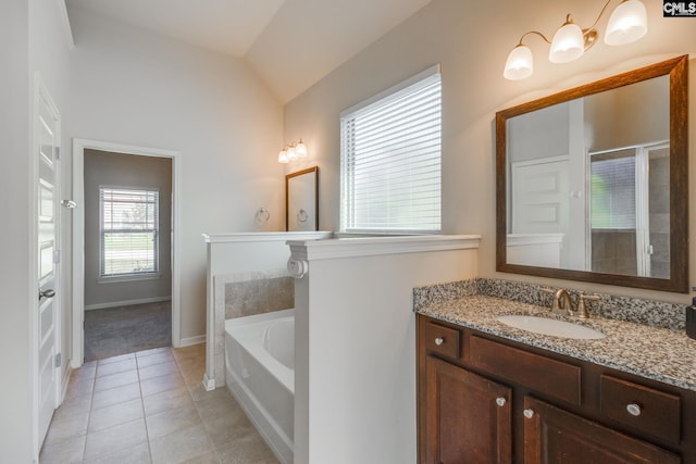 bathroom with separate shower and tub, vanity, vaulted ceiling, and tile patterned flooring