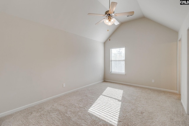 carpeted empty room with lofted ceiling and ceiling fan