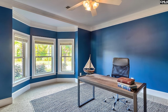 carpeted office space featuring ornamental molding and ceiling fan