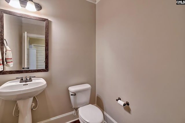 bathroom featuring toilet