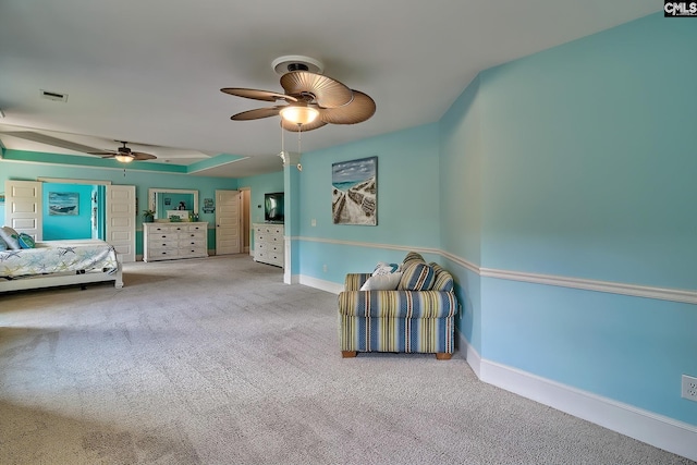 unfurnished bedroom with ceiling fan and carpet floors