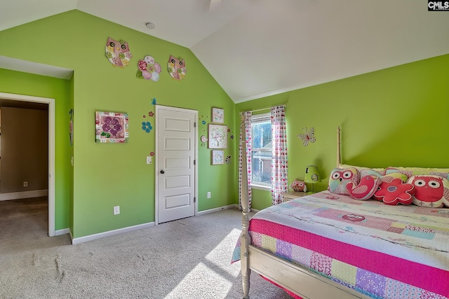 bedroom featuring vaulted ceiling and carpet floors