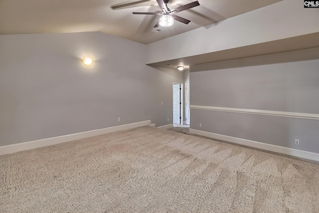 basement featuring carpet flooring and ceiling fan