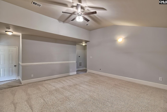 interior space featuring ceiling fan and lofted ceiling