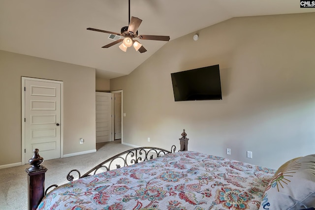 carpeted bedroom featuring lofted ceiling and ceiling fan