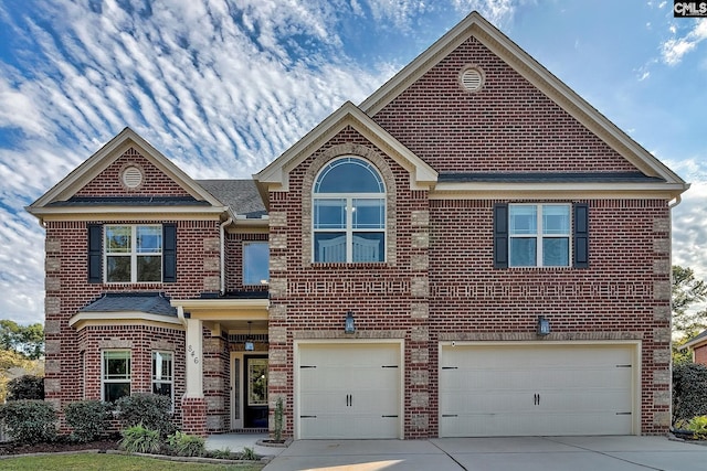 view of property featuring a garage