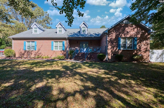 view of front of property featuring a front yard