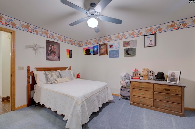 carpeted bedroom with ceiling fan