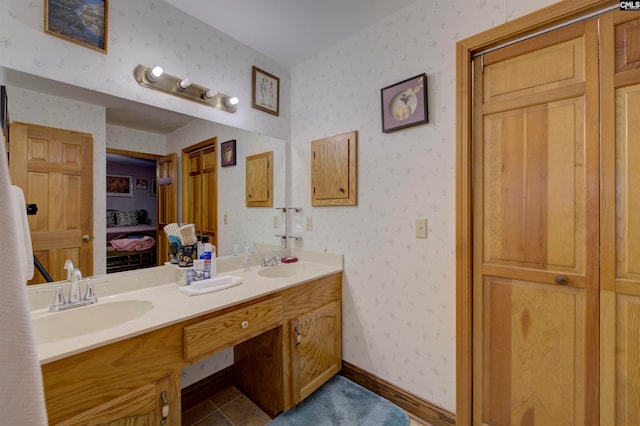 bathroom with vanity and tile patterned floors