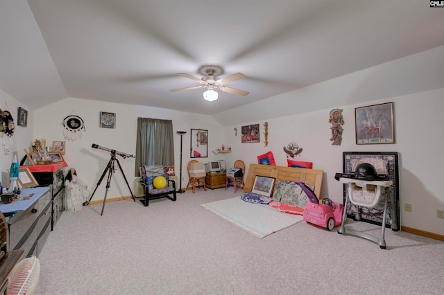 game room featuring lofted ceiling, carpet floors, and ceiling fan