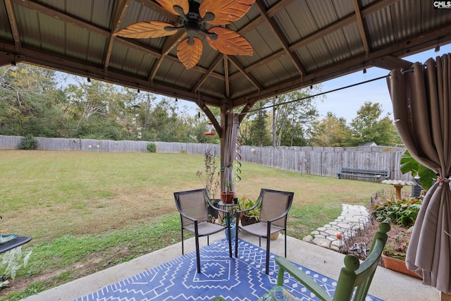 view of patio with a gazebo and ceiling fan