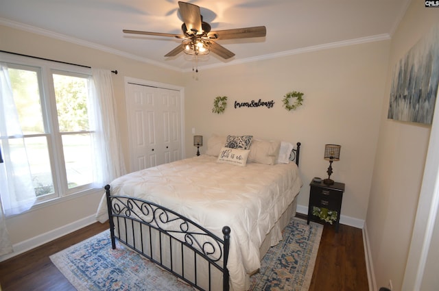 bedroom featuring a closet, ceiling fan, crown molding, and dark hardwood / wood-style flooring