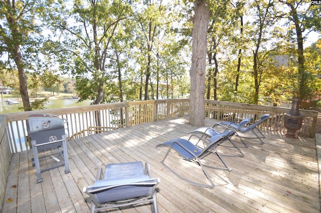 wooden deck with a water view