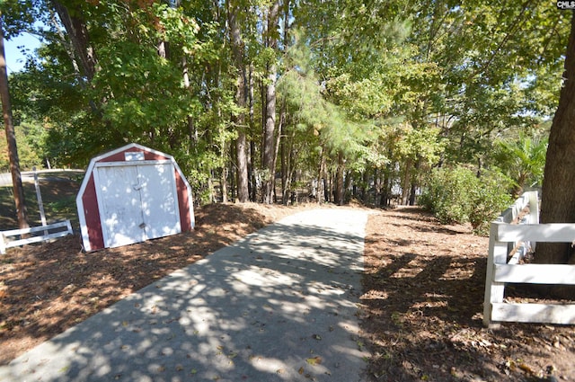 exterior space featuring a shed