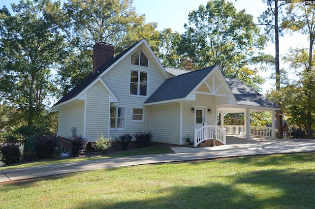 view of front of house featuring a front yard and a porch