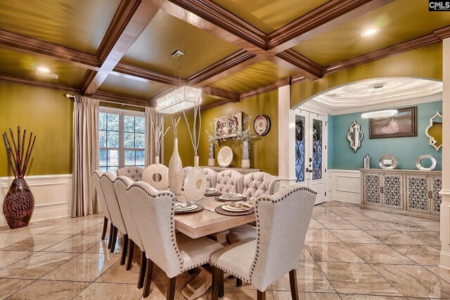 224 Robin Hood Rd, Elgin, SC 29045 - dining space featuring crown molding, a decorative wall, arched walkways, beamed ceiling, and coffered ceiling