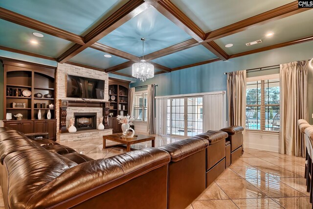 224 Robin Hood Rd, Elgin, SC 29045 - living room featuring beam ceiling, ornate columns, a chandelier, arched walkways, and coffered ceiling