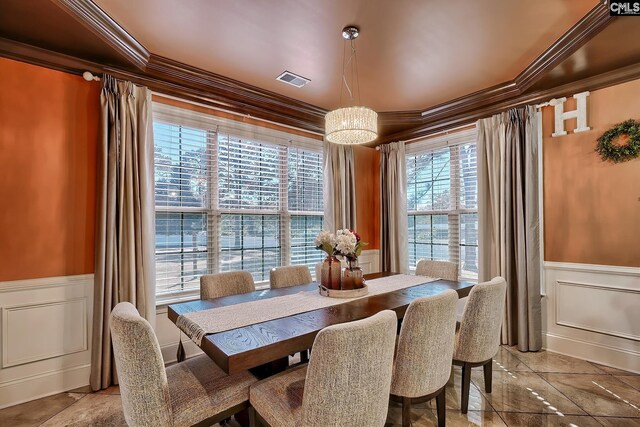 224 Robin Hood Rd, Elgin, SC 29045 - dining space featuring crown molding, a decorative wall, and visible vents