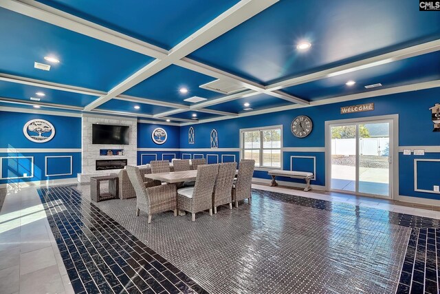 224 Robin Hood Rd, Elgin, SC 29045 - kitchen featuring a breakfast bar area, light countertops, wall chimney exhaust hood, recessed lighting, and baseboards