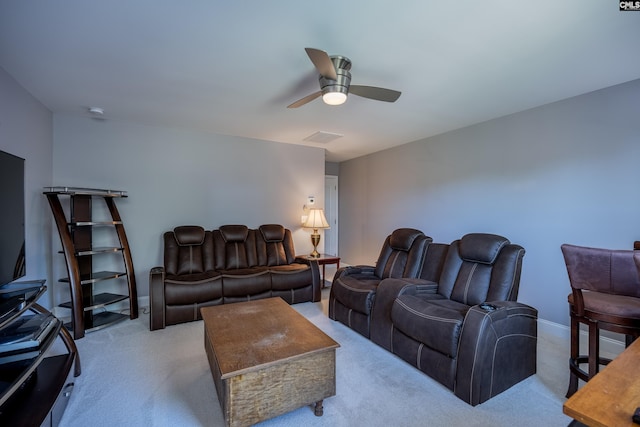 living room with light colored carpet and ceiling fan