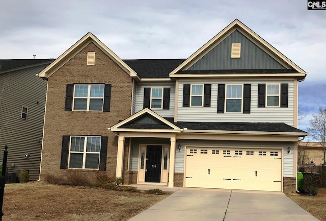 craftsman house with a garage