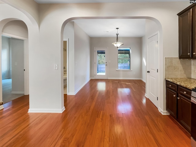 interior space with hardwood / wood-style flooring