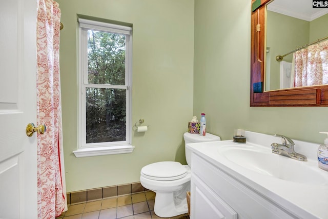 bathroom with tile patterned floors, toilet, crown molding, curtained shower, and vanity