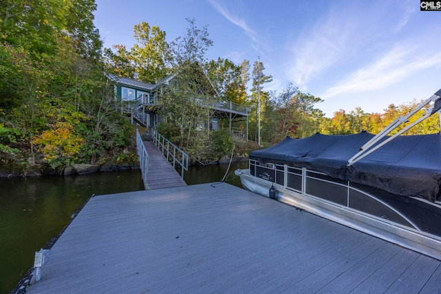 view of dock with a water view