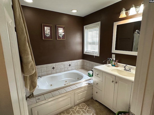 bathroom with vanity, tile patterned floors, and separate shower and tub