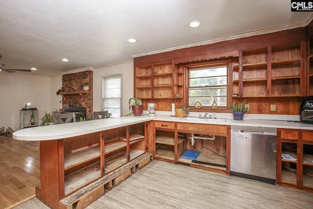 bar with dishwasher, sink, light hardwood / wood-style flooring, ceiling fan, and a textured ceiling