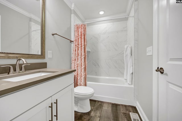 full bathroom with vanity, ornamental molding, wood-type flooring, and shower / bath combo