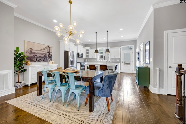 dining room with ornamental molding, dark hardwood / wood-style floors, and a healthy amount of sunlight