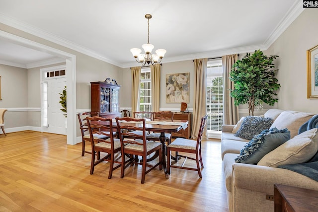 4 High Park Ct, Elgin, SC 29045 - dining area featuring a chandelier, light wood finished floors, and ornamental molding