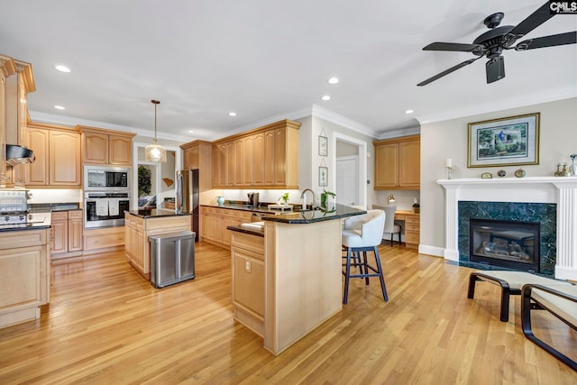 4 High Park Ct, Elgin, SC 29045 - kitchen featuring appliances with stainless steel finishes, a kitchen breakfast bar, recessed lighting, a peninsula, and crown molding