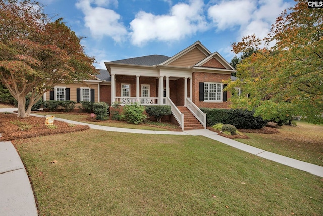 4 High Park Ct, Elgin, SC 29045 - neoclassical home featuring covered porch, brick siding, a front yard, and stairway