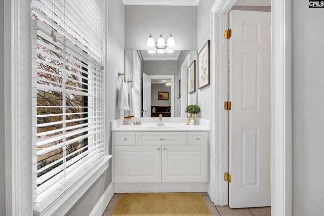4 High Park Ct, Elgin, SC 29045 - bathroom featuring ornamental molding, vanity, tile patterned flooring, plenty of natural light, and a chandelier