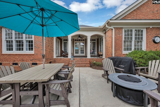 4 High Park Ct, Elgin, SC 29045 - view of patio / terrace with french doors, an outdoor fire pit, outdoor dining area, ceiling fan, and area for grilling