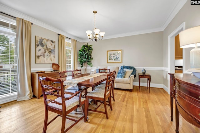 4 High Park Ct, Elgin, SC 29045 - dining area with a chandelier, light wood-type flooring, ornamental molding, and baseboards