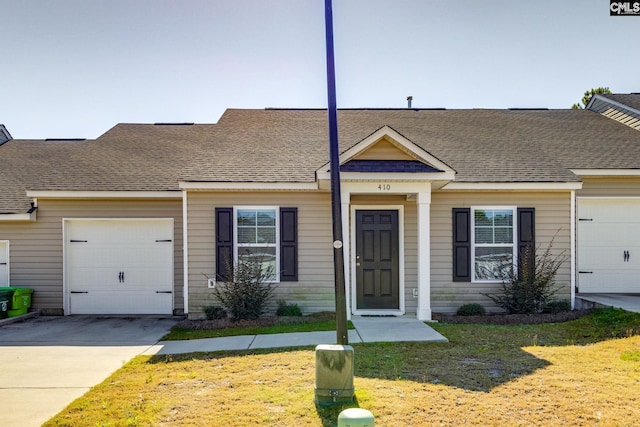 410 Pitchling Dr, Columbia, SC 29223 - view of front of property with concrete driveway, an attached garage, a shingled roof, and a front yard