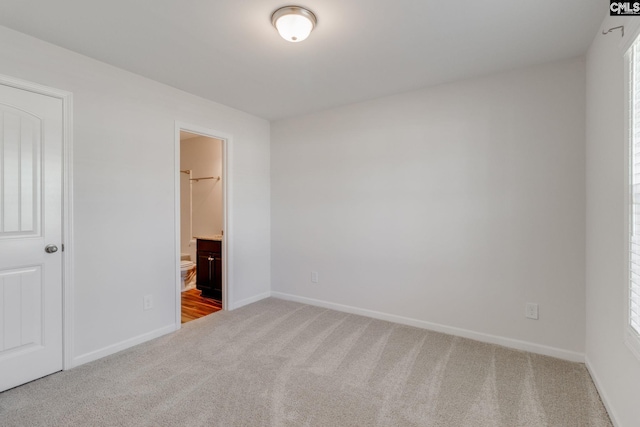 410 Pitchling Dr, Columbia, SC 29223 - unfurnished bedroom with baseboards, carpet flooring, and ensuite bathroom