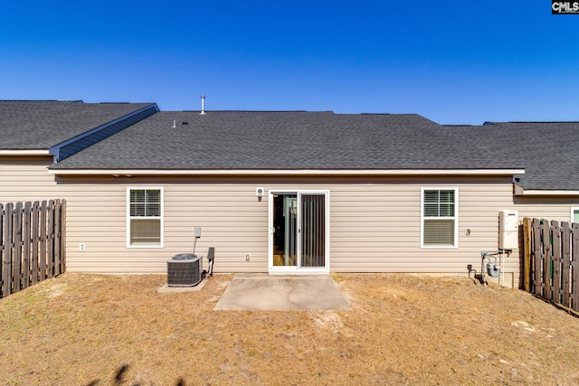 410 Pitchling Dr, Columbia, SC 29223 - rear view of property with a lawn, a fenced backyard, and roof with shingles