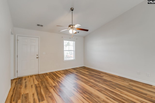 410 Pitchling Dr, Columbia, SC 29223 - spare room featuring a ceiling fan, visible vents, vaulted ceiling, baseboards, and light wood-style flooring