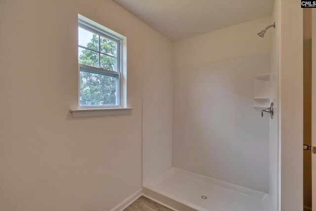 bathroom with walk in shower