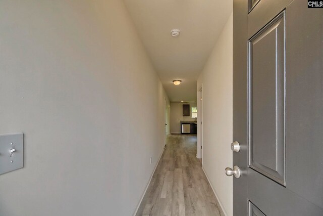 corridor featuring light wood-type flooring