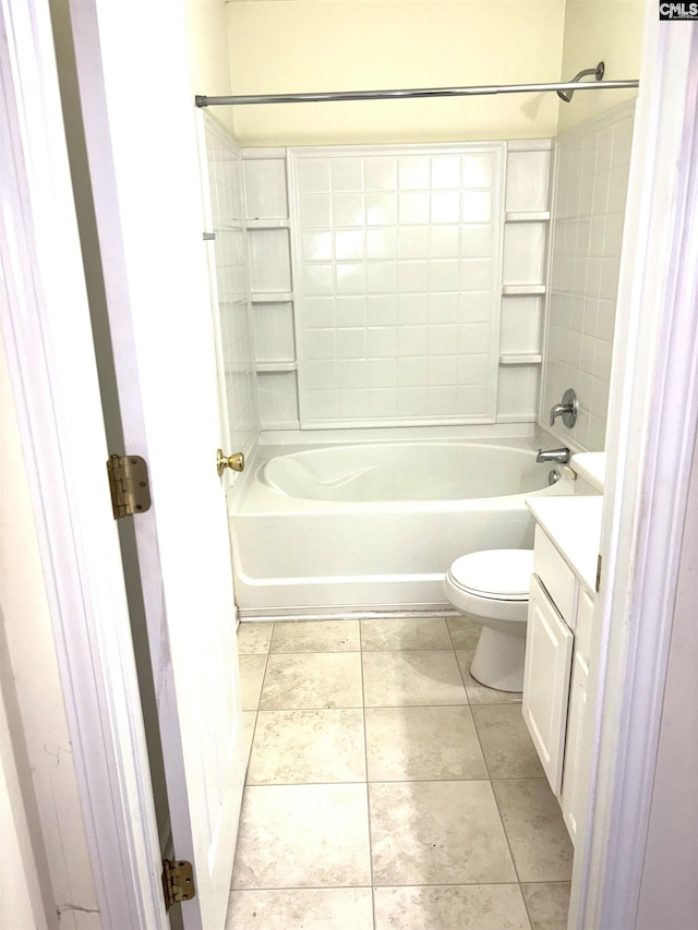 bathroom featuring tile patterned flooring, vanity, toilet, and bathing tub / shower combination