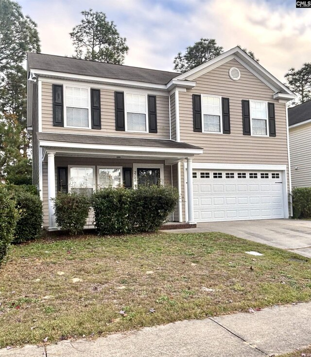 2104 Lake Carolina Dr, Columbia, SC 29229 - traditional home featuring a garage, driveway, and a front yard