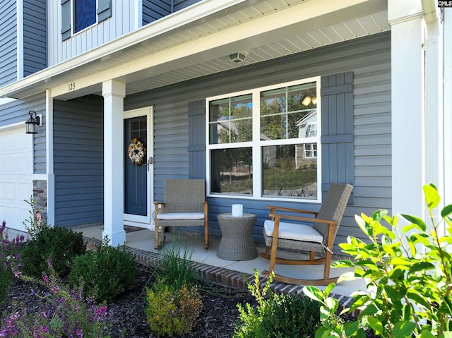 entrance to property featuring covered porch