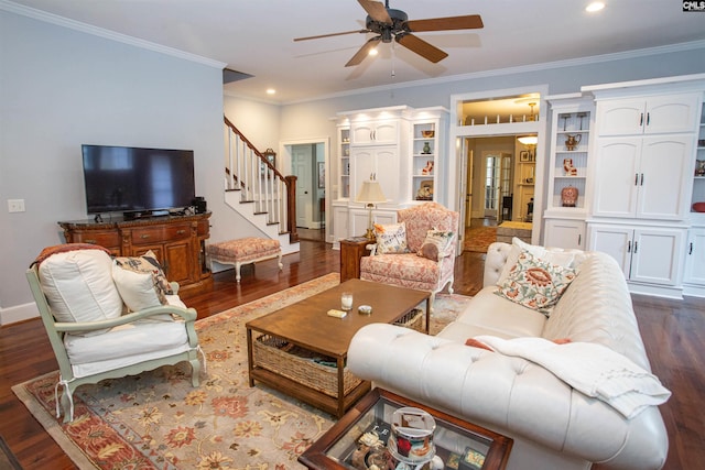 living room featuring ornamental molding and dark hardwood / wood-style floors