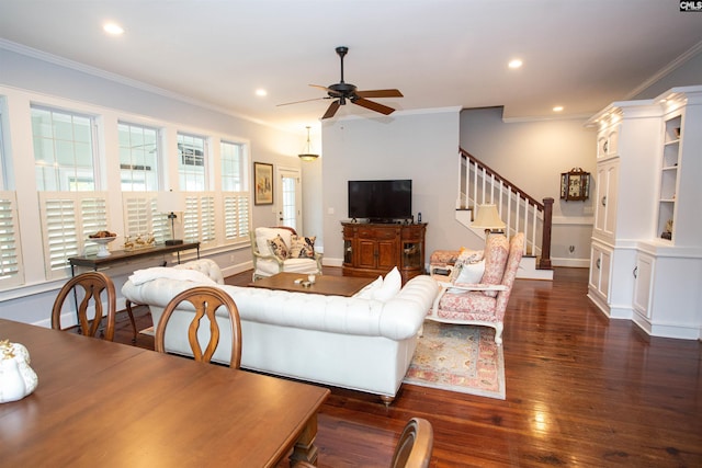 living room featuring ornamental molding, dark hardwood / wood-style floors, and ceiling fan