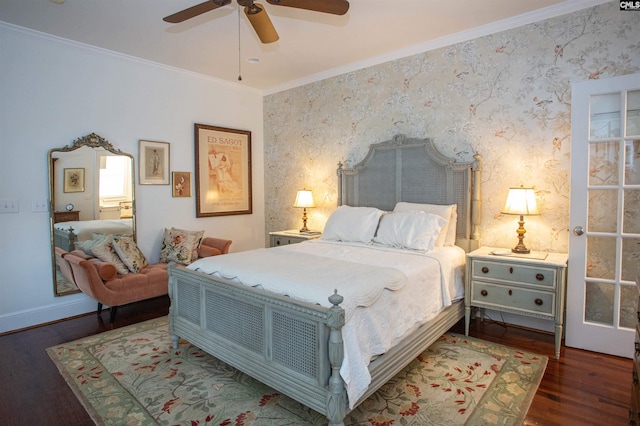 bedroom with crown molding, dark hardwood / wood-style floors, and ceiling fan